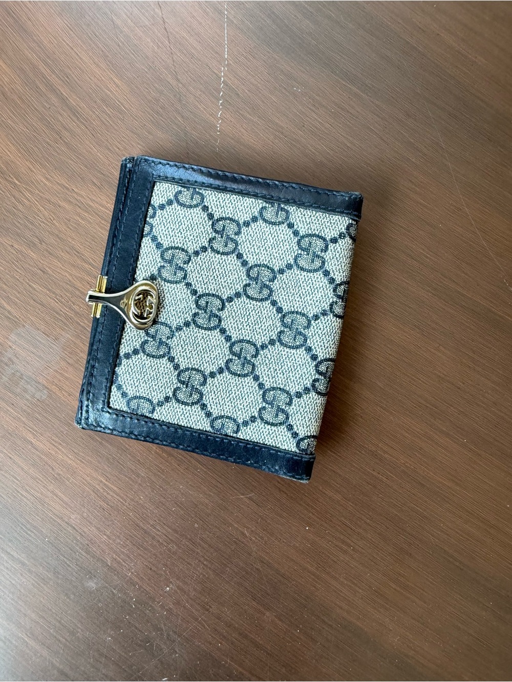 Gucci GG Monogram bifold wallet featuring navy blue leather (1980’s) - Picture 1 of 3